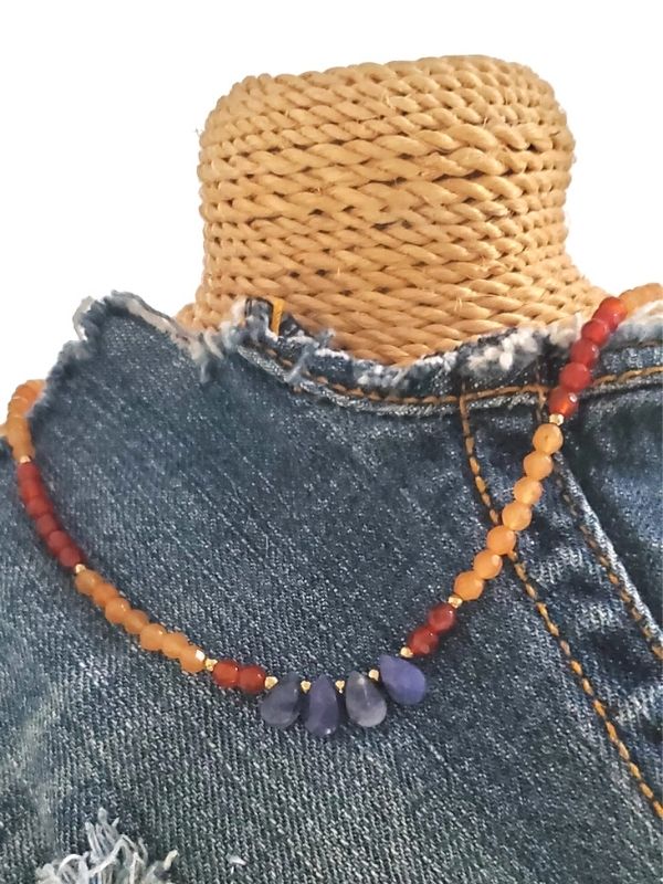orange gemstone necklace on denim