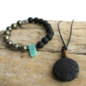 Diffuser-necklace-&-bracelet-with-gemstones-lava-on-wood-background