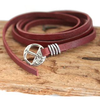 Men's-reddish-brown-multi-wrap-leather-bracelet-silver-slide-buckle-on-wood-background