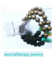 3-aromatherapy-gemstone-lava-bracelets-on-clear-glass-bottle