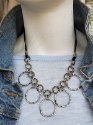 mixed metal chain cluster necklace with jean jacket