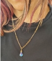 model wearing bronze bar chain Swarovski crystal necklace