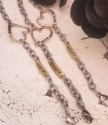 3 heart name tag  bracelets on distress white wood