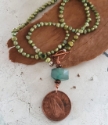 Ireland coin green pearl teal gemstone necklace on wood