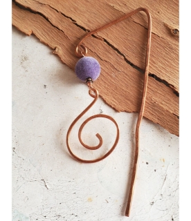 copper spiral bookmark with purple pom-pom