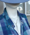 Silver chain oval stick necklace on mannequin