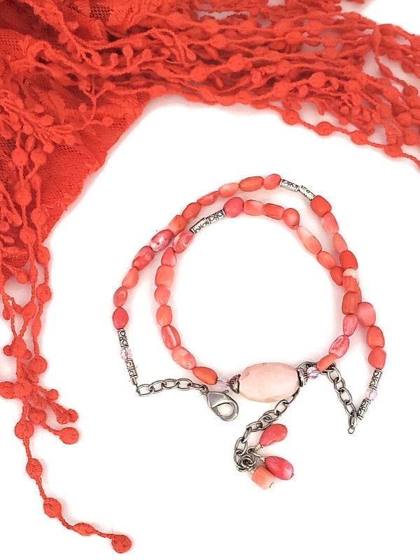A Summer scarf and bracelet in coral pink