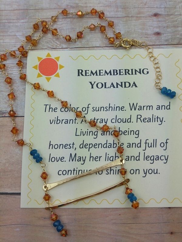 yellow crystal memorial necklace with card